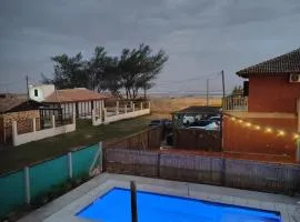 Casa Beira da praia com piscina