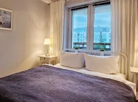 HOLIDAY HOME Neptun 3 z osobną sypialnią i balkonem