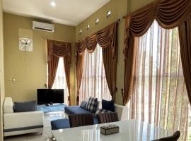 Chika Homestay, отель в городе Wringinanom