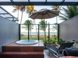 Loft com hidromassagem frente mar e pé na areia
