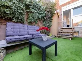 Apartamento con jardín privado