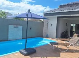 Mar Doce Lar Casa na praia de guaratuba com piscina e ar condicionado