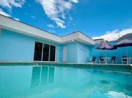 Casa Espaçosa com Piscina a 300m da Praia 5 Quartos e Conforto Total!
