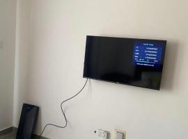 Suite 205 Oasis Park Residencies, hotel in Oost-Legon