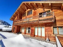 Chalet confortable au pied des pistes avec terrasse et parking - FR-1-292-222