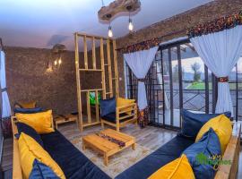 Ivy Homes - Kapchorwa、Kapchorwaの駐車場付きホテル