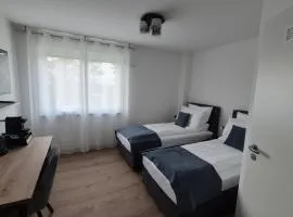 Apartments Seibel Doppel-Zweibettzimmer mit Bad
