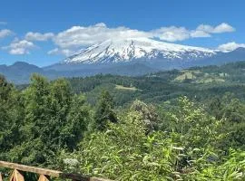 Cabaña Licanray, vista volcán Villarrica y lago Calafquén