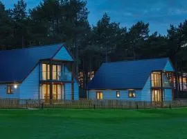 Le Strange Arms Garden Lodges