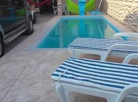 Casa de temporada com piscina