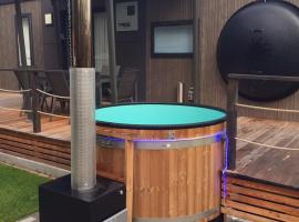 Mobilheim am Murner See - privater Badezuber & Grill, hotel con hidromasaje en Wackersdorf