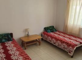 Town house beach 1, hotel i Fare