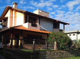 Casa espaçosa e acolhedora em Garopaba, hotel in Garopaba