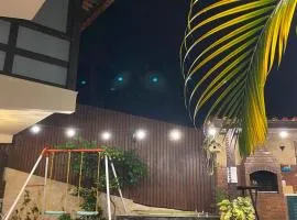 Aconchego de Itaipava - casa de 3 quartos, equipada, área kids, jacuzzi, pet friendly, churrasqueira, em meio a Natureza e próximo ao centro do bairro