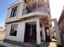 Au coin de la rue de Goma, parkimisega hotell Gomas