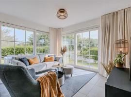 Cozy apartment with garden and terrace, hotel en De Haan