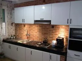 Feels Like Home, Nice Apartment with Garden View in center, Close to Beach