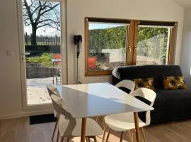Maisonnette avec parking privé et local à velos