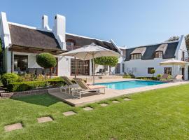 Die Rietdak - Reetdachhaus mit vier Schlafzimmern, hotel en Ciudad del Cabo