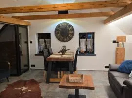 Podkrovní stylový mezonetový apartmán