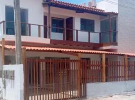 Duplex com quatro suítes