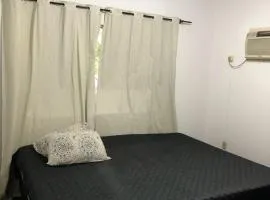 Quarto econômico 50 metros da praia