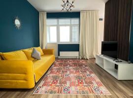 Уютная квартира с видом на горы напротив ТРЦ Mega - Braun, hótel í Almaty