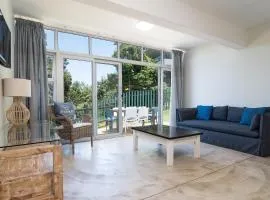 Escape to an Umdloti Beach Condo with a Communal Pool & Braai Area
