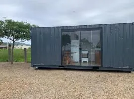 Contêiner aconchegante na praia