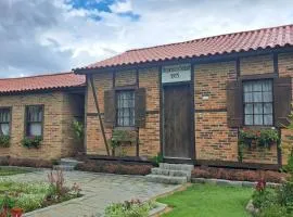 Caminhos da Serra do Tabuleiro - Casa Centenária Enxaimel 1915