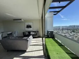 Penthouse with Volcano Views & Top Amenities - AC, Gym, Lounge, Patio, Workspace