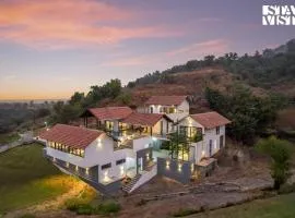 StayVista at Ekan with Sea views, Pool, WiFi