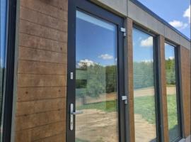 Domek nad rzeką Marycha, farm stay in Giby