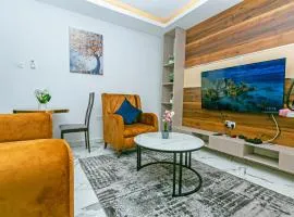 Aster Luxury Apt close to Airport & Mall with Rooftop pool & gym
