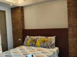 LDN CRIB 7D - Two Palm Tree Condo、マニラにあるニノイ・アキノ国際空港 - MNLの周辺ホテル