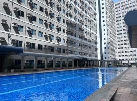 642 - Quiet & secured condo in Cavite with HI speed WIFI，達斯馬里尼亞斯的分租公寓