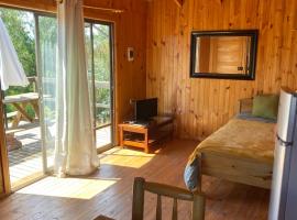 Cabañas Refugio Las Conejas, hotel v destinaci Pelluhue