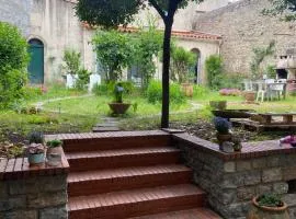 Appartement cosy avec oasis privée, salle de jeux, vélos bienvenus