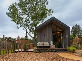 Tinyhouse luxe met hottub、メールッセンのコテージ