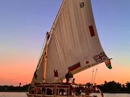 Aswan Felucca sailing boat and Hotel