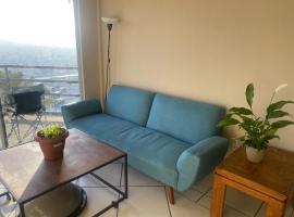 Habitación en departamento con vista a la ciudad