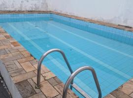 Casa para 10 pessoas com piscina, hotel v destinaci Guarujá