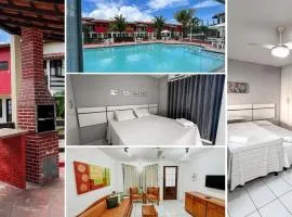 Casas no Residencial Mont Sinai com 2 ou 3 suítes (todas com ar), internet privativa 300MBPS a aproximadamento 250m da Praia de Taperapuã, condomínio com piscinas adulto e infantil, sauna, churrasqueiras e Segurança 24hrs.