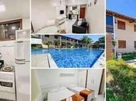 Flat com 1 quarto com ar split, sala e cozinha completa, No condomínio Portal do Atlântico a 100m praia de Taperapuã (Barraca do Gaúcho) , portaria 24hrs, piscina.