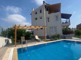 Detached villa in antkoop, hôtel à Serik