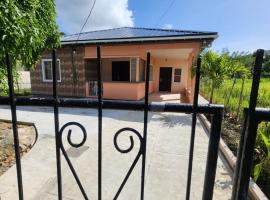 AG3K Oasis, hytte i Buccoo