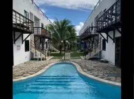 Apartamento pé na areia na praia de enseadas dos corais-Gaibu, em frente as piscinas naturais