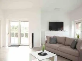 Wunderschöne und moderne Ferienwohnung mit Garten