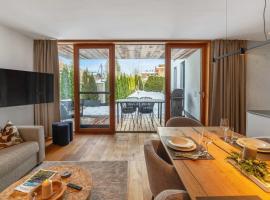 Modern garden apartment with sauna near ski lift, hotel v destinaci Feuring
