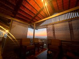 Mountain Whispers Splendour Guest House, apartmán v destinaci Madikeri